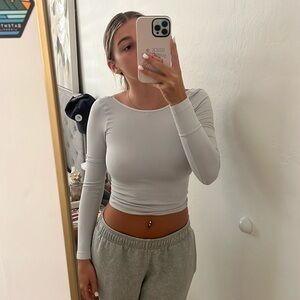 free people open back shirt, icy blue color, worn once